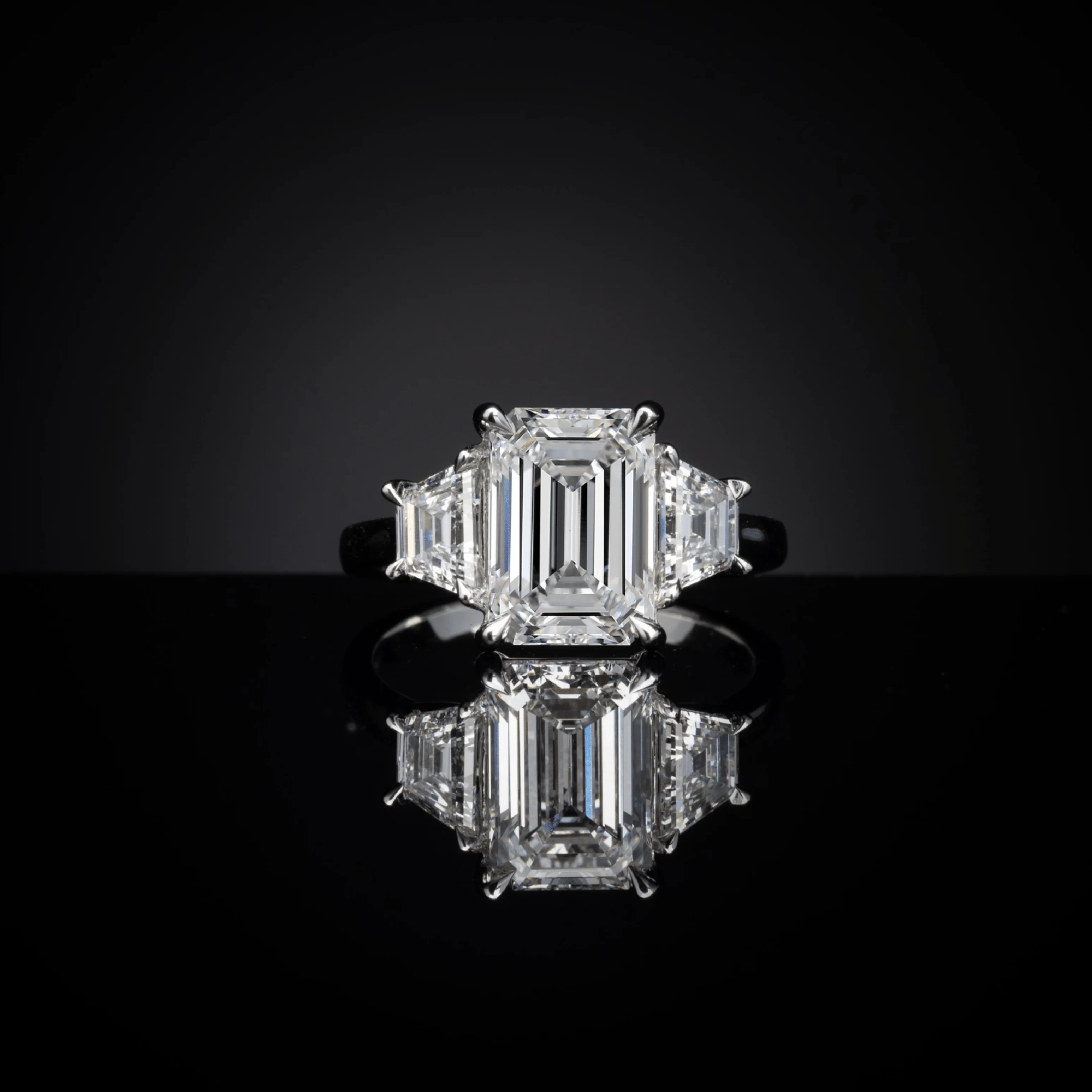6.9 Carat Emerald Lab Grown Diamond Three-Stone Ring