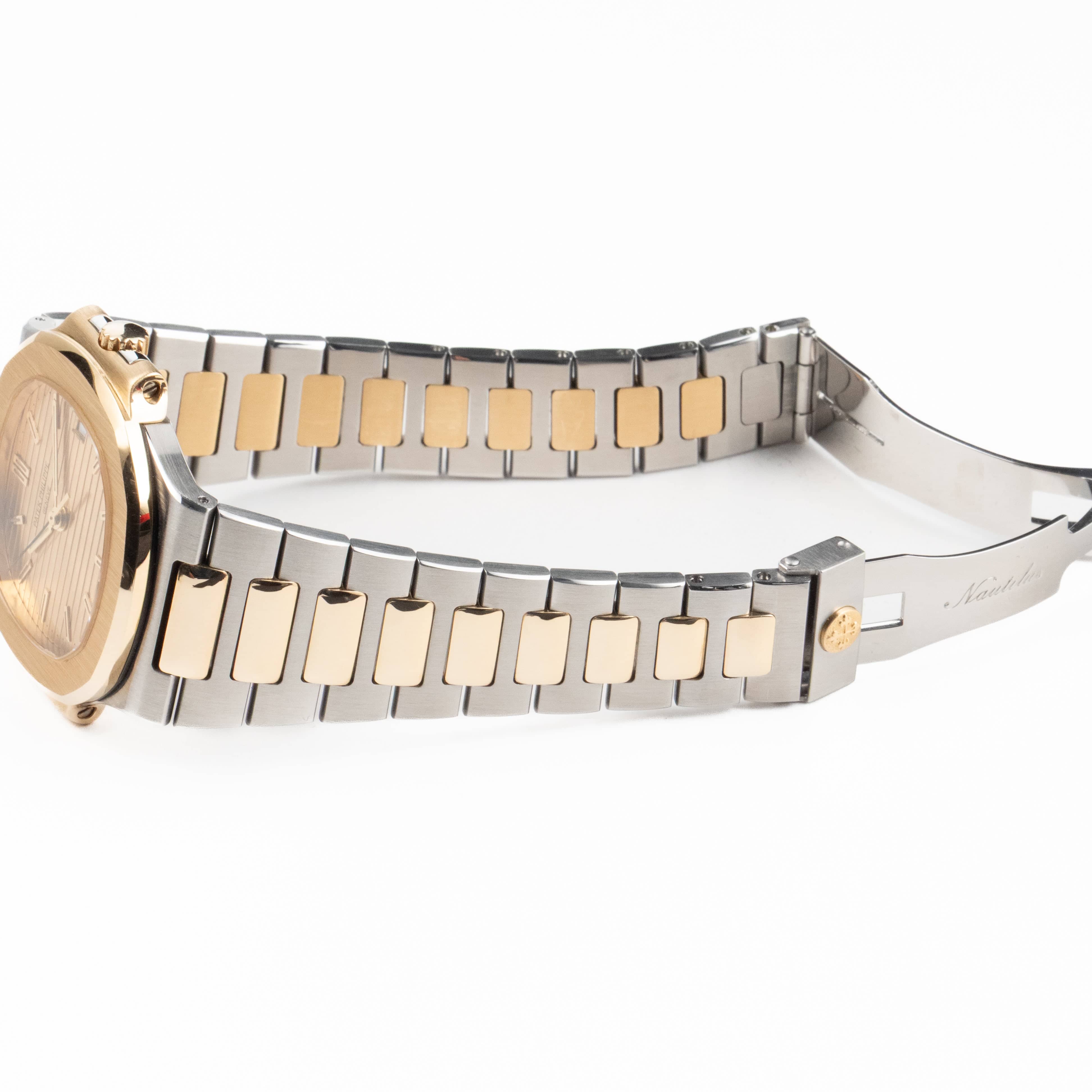 Patek Philippe Nautilus 3800/1AJ Stainless Steel Yellow Gold Champagne Dial - Image 10